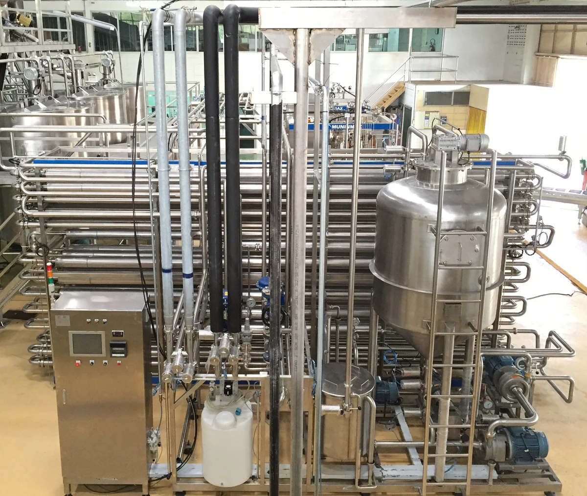 Pasteurization Systems: Pasteurization skid in an installed setting.