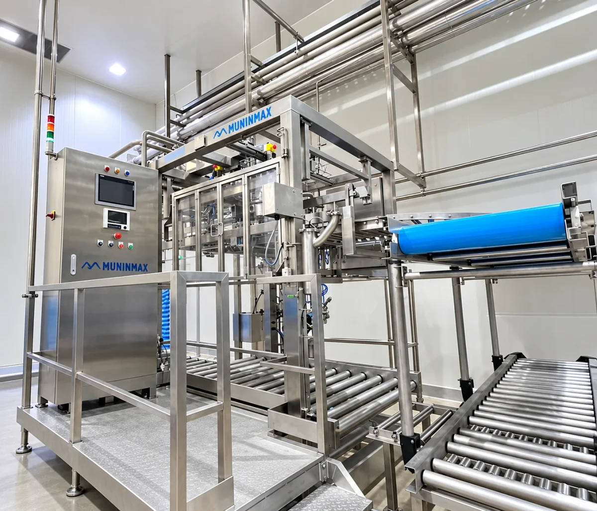 Aseptic Bulk Bag Fillers: Aseptic filler head and roller-conveyor arrangement.