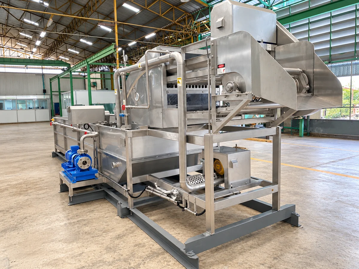 Washing equipment with a conveyor, pipework and blower.