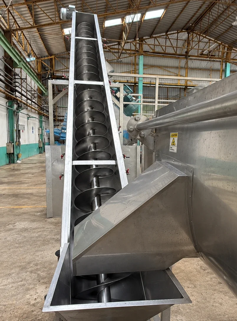 Conveyor: Inclined conveyor transfer arrangement.