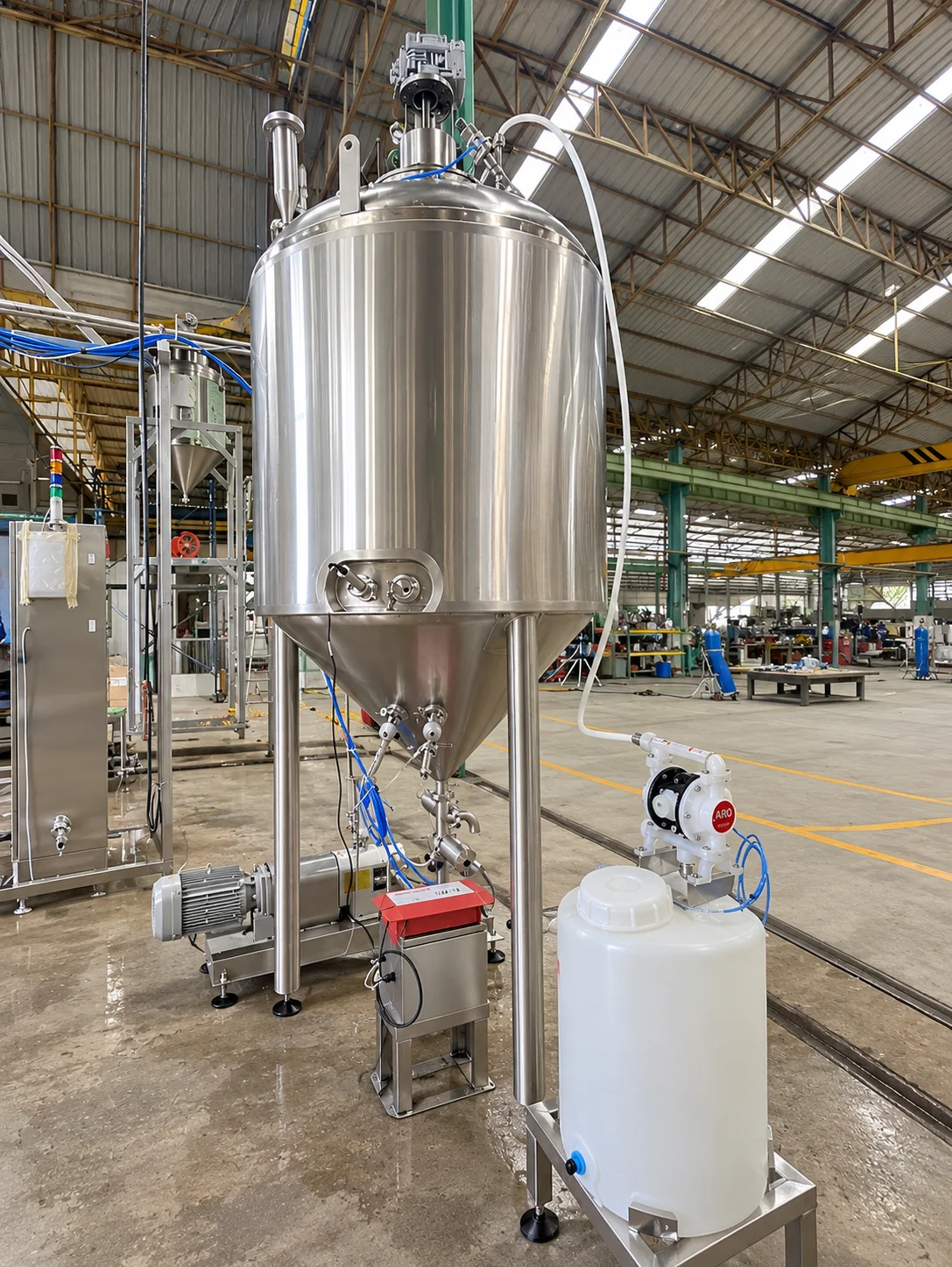 Blending Tanks: Blending vessel outlet and pump arrangement.