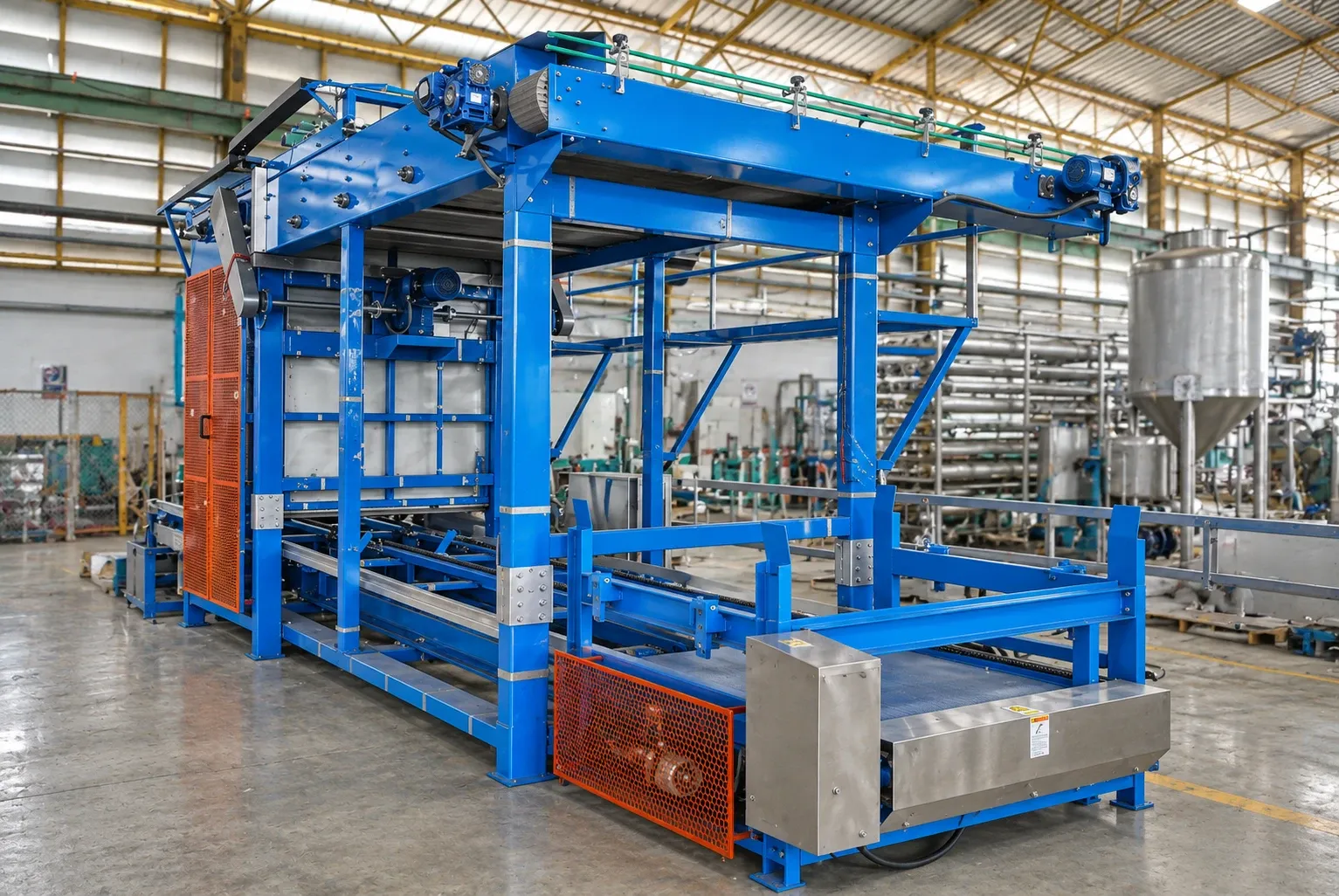 Can depalletizing equipment with a blue steel frame, upper conveyor and guarded lifting section.